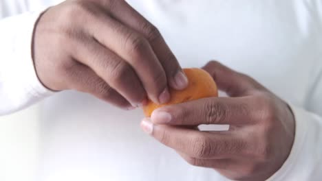 peeling an orange