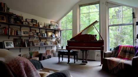 cozy living room with piano and pictures