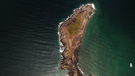 peninsular isthmus surrounded by sea in the pacific ocean seen from above