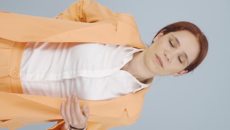 Vertical-video-of-Business-woman-experiencing-back-pain.