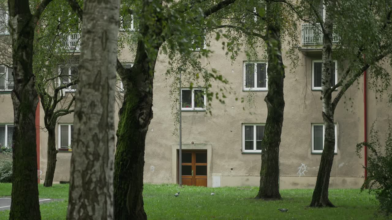 Soviet era standard housing apartment block with resident green space