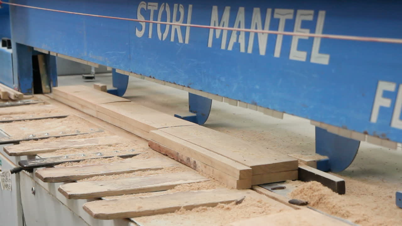 Floorboard Production In The Factory. VINNITSA, UKRAINE - MARCH 2017: Floorboard production in the industrial factory. Modern technologies.