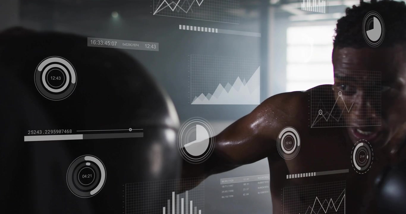 Vertical video: Timer starting man in black gloves training on heavy bag at gym while stats showing
