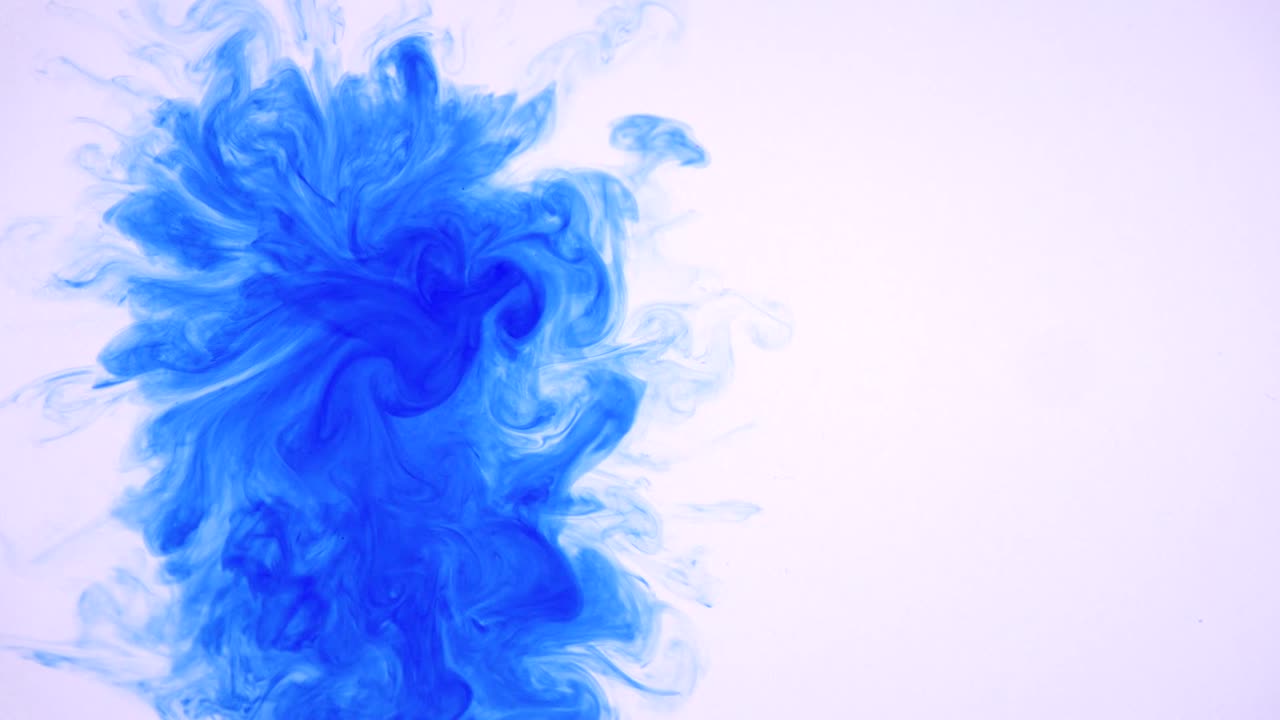 Blue ink drop in water to use as a great reveal effect