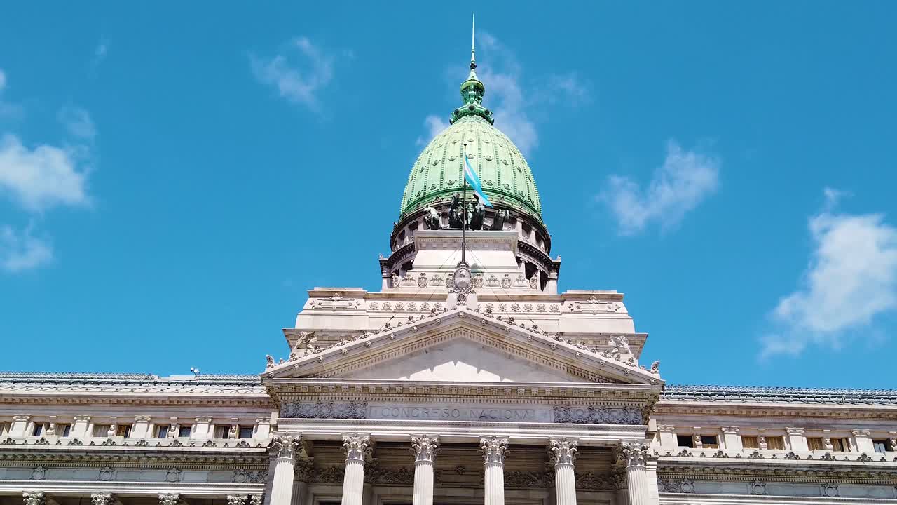 Establishing Argentine Congress building, national flag over blue daylight skyline, National emblem of Buenos Aires city