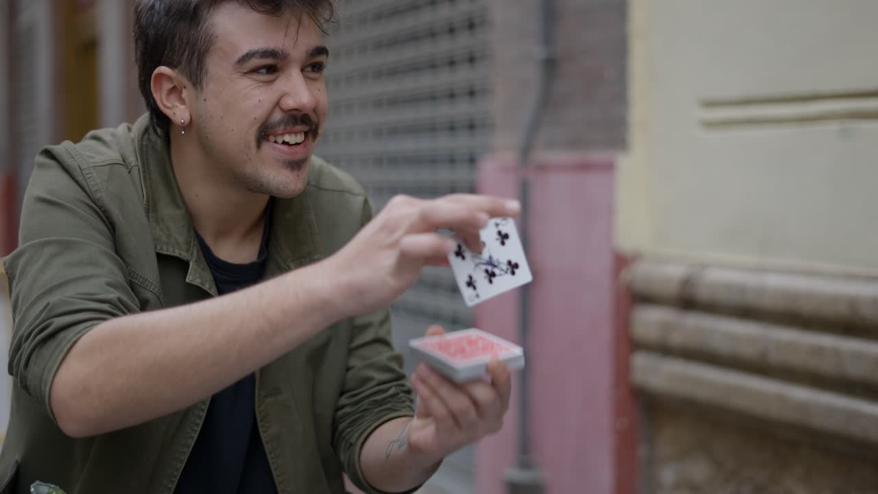 Street Magician Performing Card Tricks