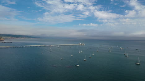 slow moving aerial shot over the harbour and pier at san luis obispo, california