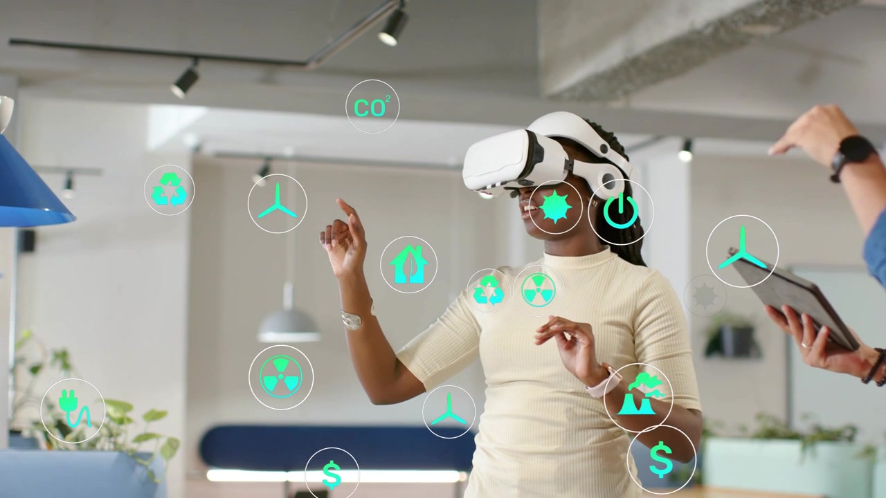 Woman in VR raising hands, starting green AR icons filling as tech colleague guiding tablet testing