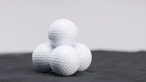 white golf balls in studio