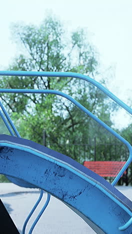 close up of a blue slide on a playground