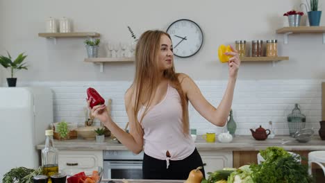 girl recommending eating raw vegetable food. showing peppers in hands. weight loss and diet concept