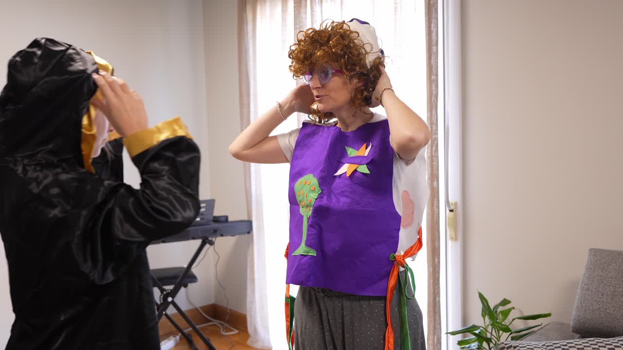 Girl Helps Woman Try on Funny Costume Glasses