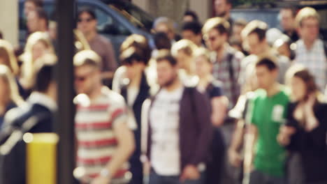 Anonymous-crowd-of-business-people-walking-in-city-streets-london-summer-2014