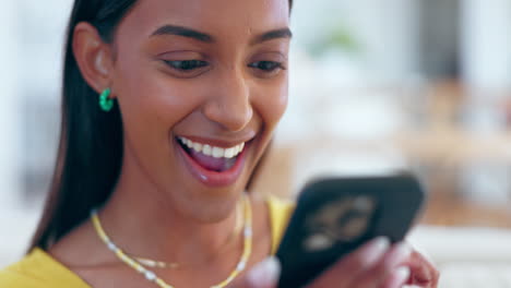 Surprise,-sofa-and-excited-woman-with-phone