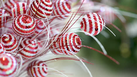 christmas red and white ornaments at first plane