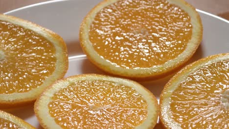 round slices of orange on a cutting board