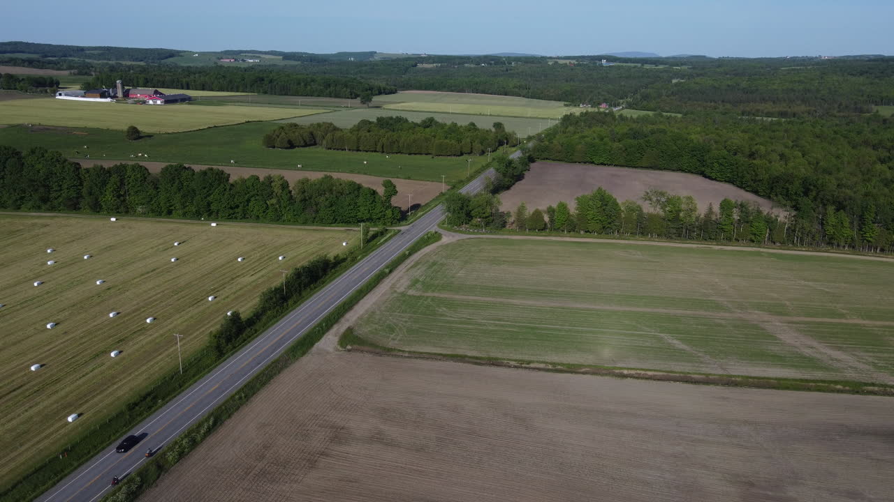 Drone shot over fields around Coaticook Quebec Canada