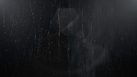 Rain-effect-on-dark-black-wall