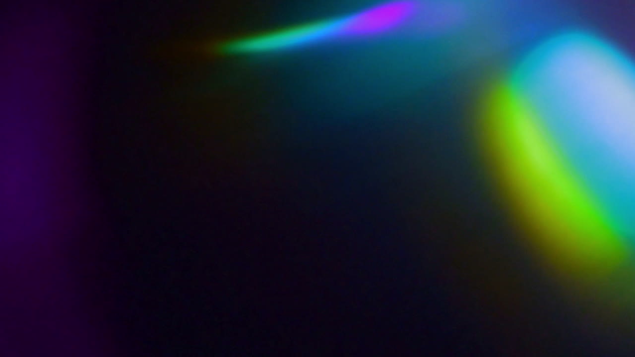 Transizione astratta e colorata con fuoriuscite di luce e sovrapposizione bokeh.