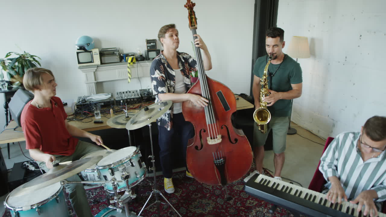 Band playing instruments in a studio