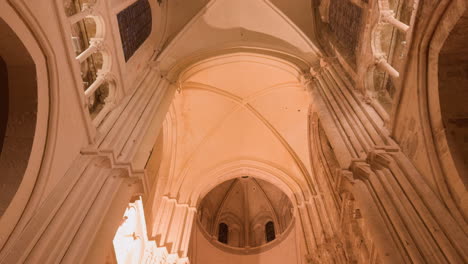 tilt down view of painted ceiling of saint-nicolas church with vintage old architecture in blois, france. no people.