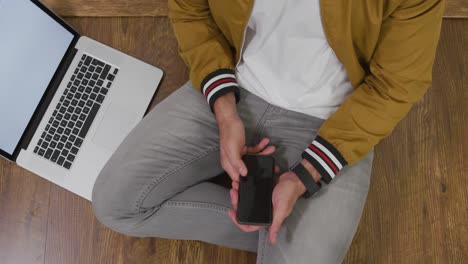 caucasian man using his phone