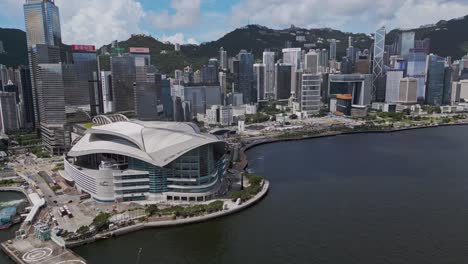 aerial of the hong kong convention and exhibition centre and city skyline, wan chai, hong kong, china