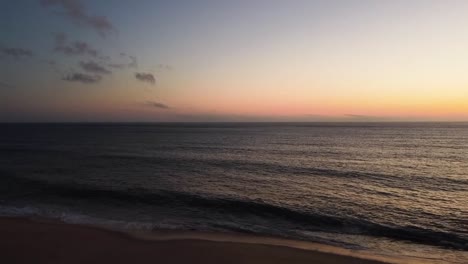 Drone-shot-facing-the-ocean-during-sunset