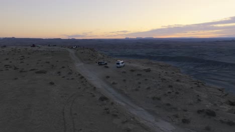 Driving-along-desert-road-of-Factory-Butte-in-Utah,-USA