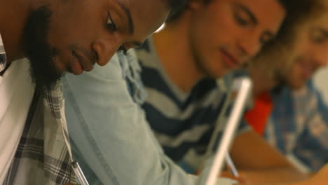 students taking notes in lecture