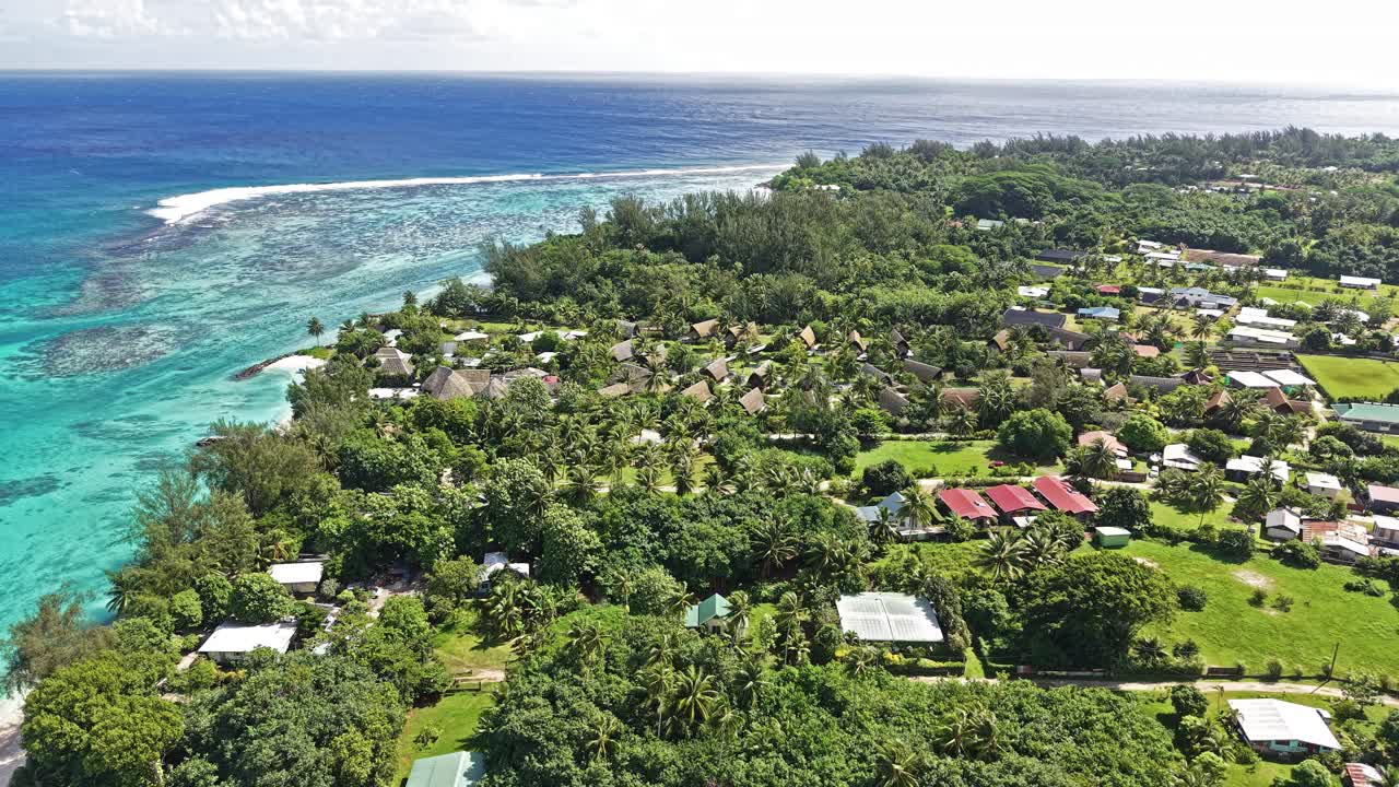 Huahine Island, French Polynesia. Aerial View of Landscape, Buildings and Turquoise Lagoon Water