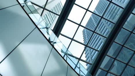 transparent roof and metal ceiling beams with sunshine through the glasses