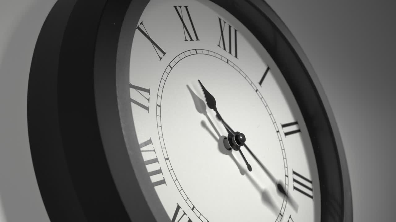 Latin Clock Face in Time Lapse on White Wall