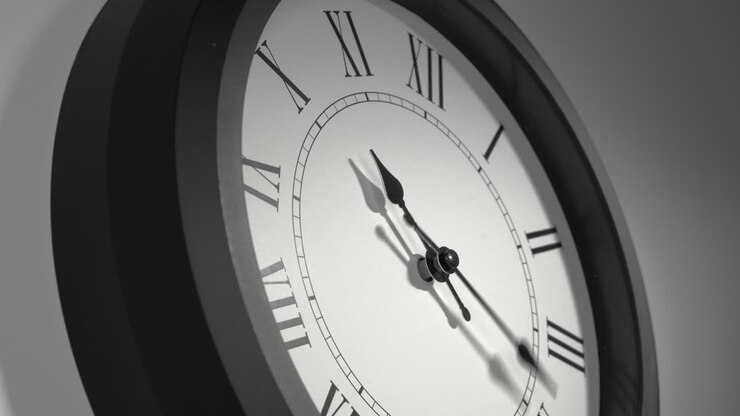 Latin Clock Face in Time Lapse on White Wall