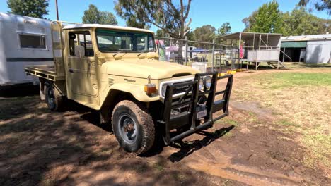 old-fashioned vehicle stationary in a rural setting