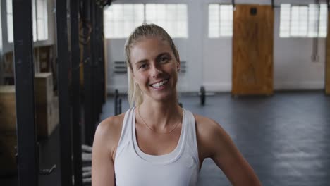 Portrait-athletic-Caucasian-woman-smiling-at-the-camera