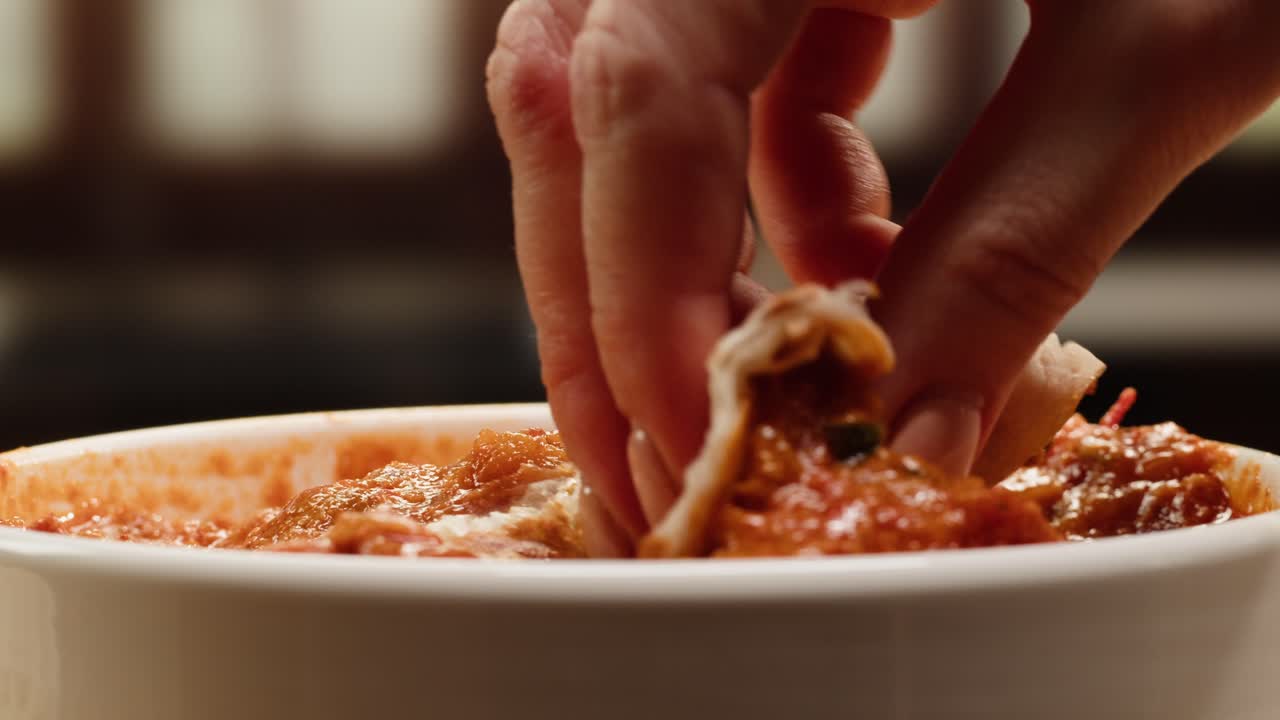 Dipping bread in food