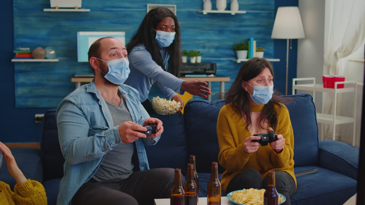 Excited group of multiethnic friends celebrating victory