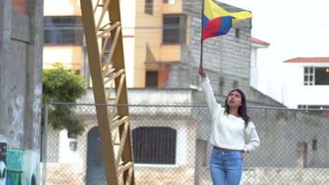 waving ecuador flag above head of latin america young hopeful woman