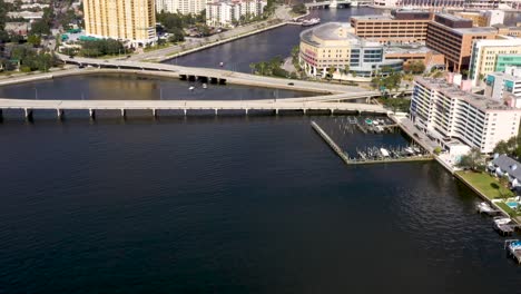 waterfront coastal city landscape of tampa bay, florida - aerial tilt-up reveal