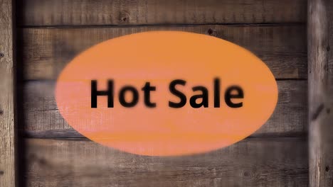 letrero de venta en caliente en caja de madera