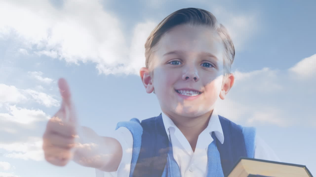 책 을 들고 있는 백인 소년 위 의 구름 의 애니메이션