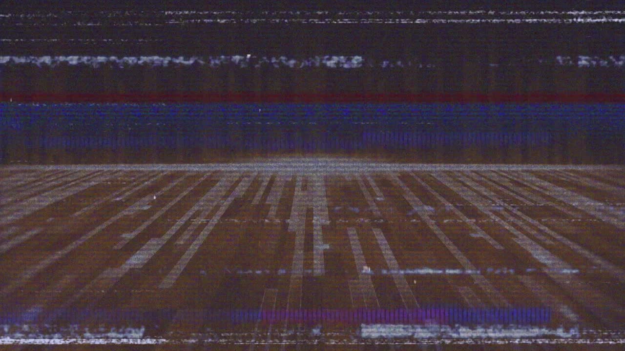 Animation of glitch interference over neon lines on black background