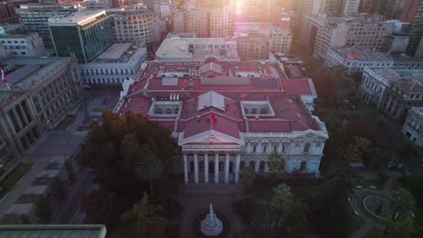 aerial view looking down over chamber of deputies of santiago during glowing sunrise