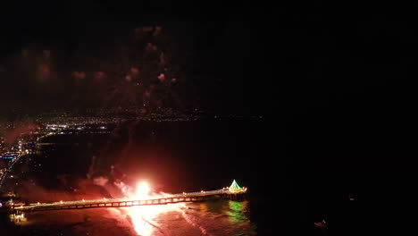 colorful fireworks at manhattan beach pier at night in manhattan beach, california, usa