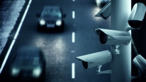 cámaras de cctv sobre una carretera concurrida