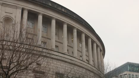 corinthian columns around the building of manchester central library in manchester, england