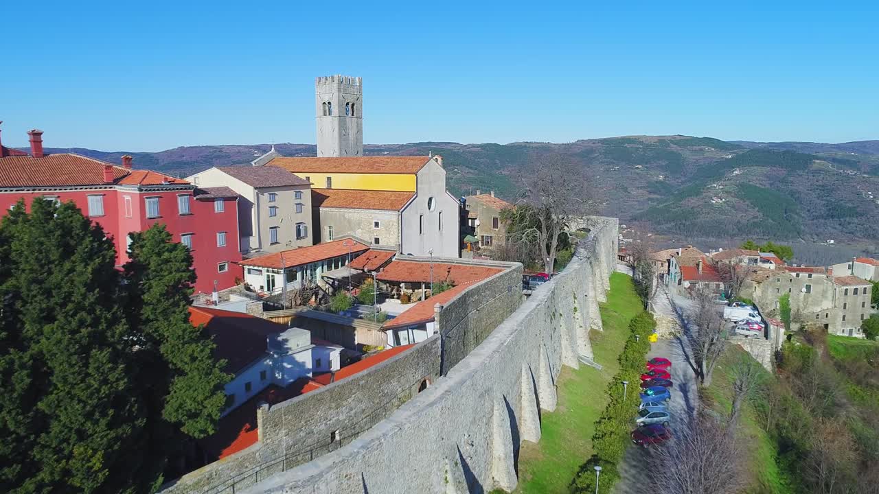Istrian medieval town of Motovun, Croatia. Walled hilltop town. Aerial fly over