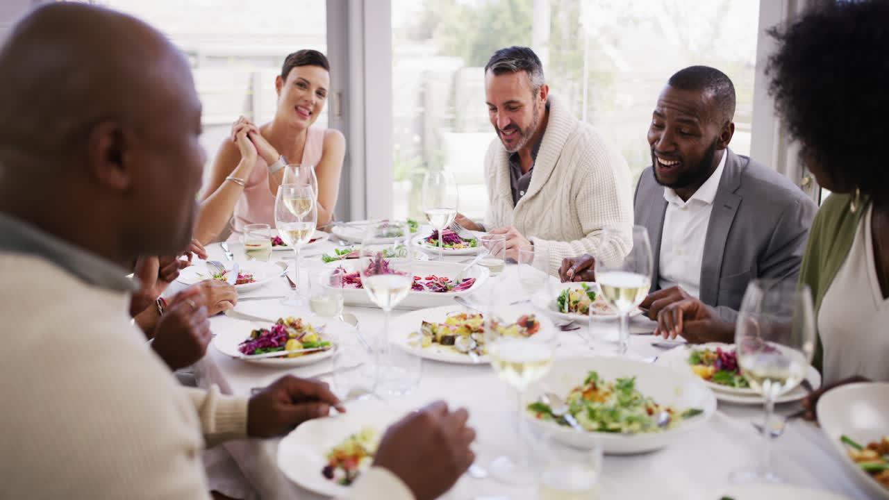 Diverse group of friends eating food