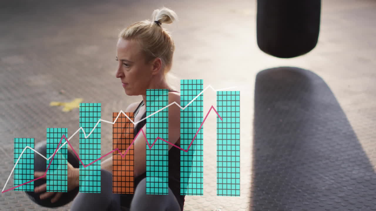 animación de diagrama sobre mujer caucásica haciendo ejercicio en el gimnasio